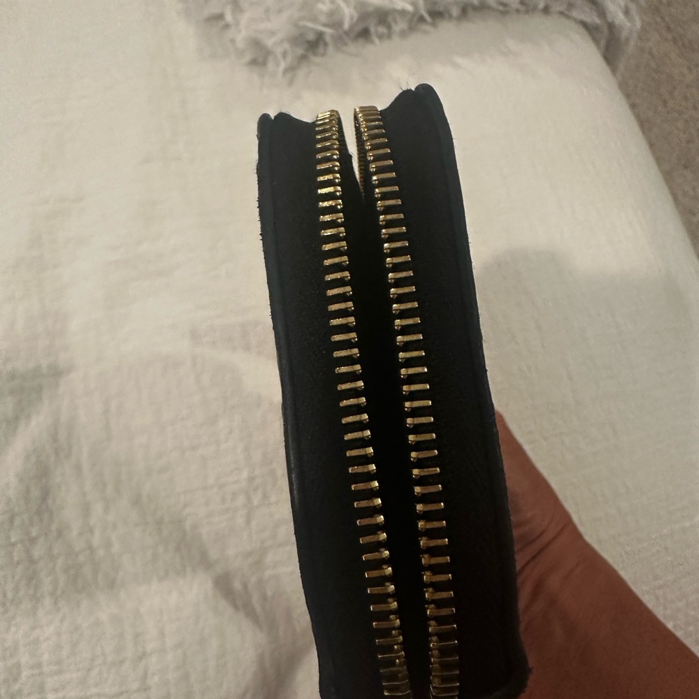 Authentic Louis Vuitton Black Zippy Wallet. 
Monogram Empreinte Leather. - Picture 12 of 16